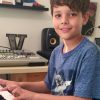 Young piano student in his lesson
