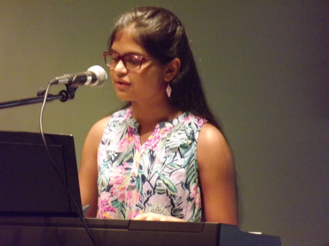 Zoya accompanying herself on piano at a 2019 concert